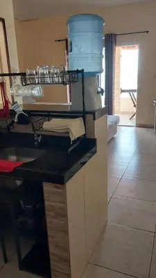 A cozinha ou kitchenette de Chalés Canto do Mar