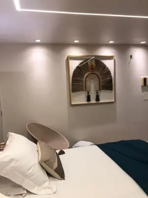 Uma cama ou camas num quarto em Fortaleza 703--Fortaleza 713