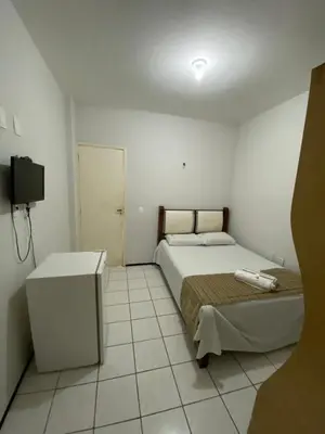 Uma cama ou camas num quarto em Center 1 Hotel