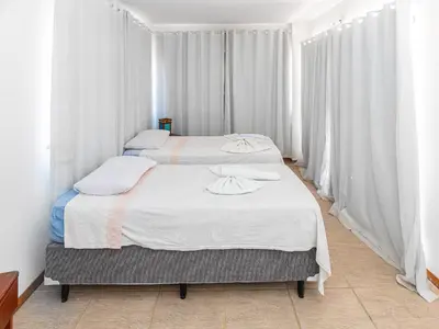 Uma cama ou camas num quarto em Cumbuco Dream Village Duplex with 3 bedrooms