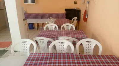 Uma cama ou camas num quarto em Hospedaria Praia e Sol