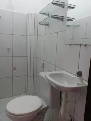 Uma casa de banho em Suíte central Pousada