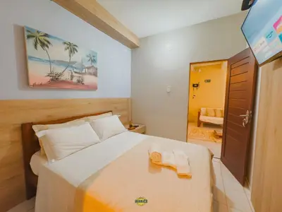 Uma cama ou camas num quarto em Pousada Melgaço