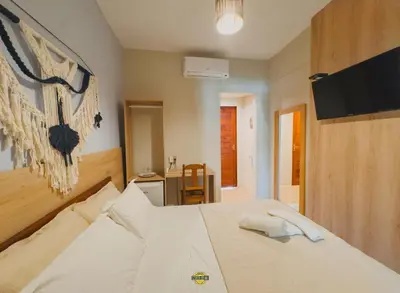 Uma cama ou camas num quarto em Pousada Melgaço