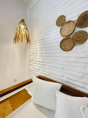 Uma cama ou camas num quarto em Villa Mar Residence