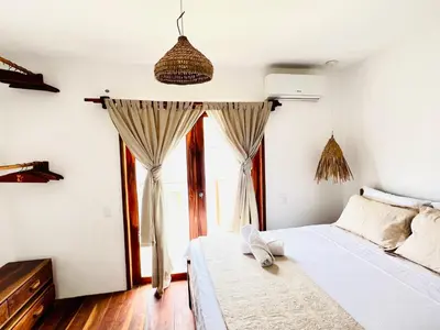 Uma cama ou camas num quarto em Villa Mar Residence