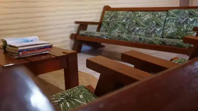 Uma área de estar em Casa de Praia no Porto das Dunas
