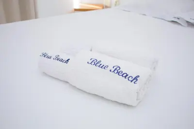Uma cama ou camas num quarto em Blue Beach Temporada