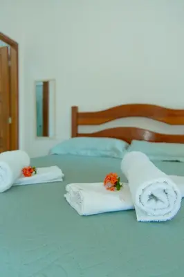 Uma cama ou camas num quarto em Pousada Águas Claras