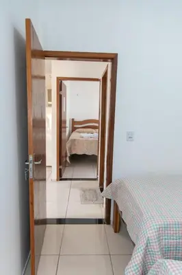 Uma cama ou camas num quarto em Pousada Águas Claras