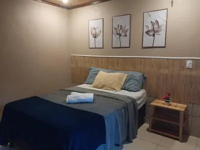 Uma cama ou camas num quarto em Monte Suiço - Chalés para locação