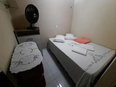 Uma cama ou camas num quarto em Apartamento Central