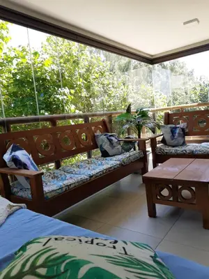 Uma área de estar em Apartamento Waiwai Cumbuco