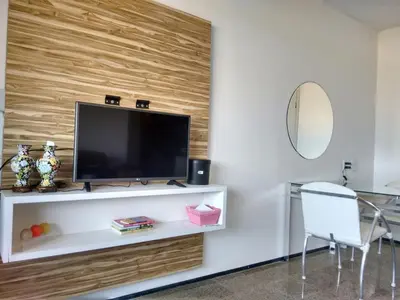 Uma televisão e/ou sistema de entretenimento em Residence Van Piaget