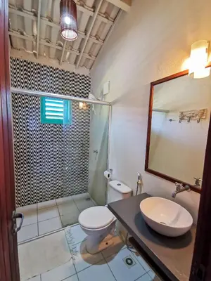 Uma casa de banho em La Villa Tropicale linda casa pertinho do mar !