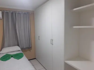 Uma cama ou camas num quarto em Porto de Iracema