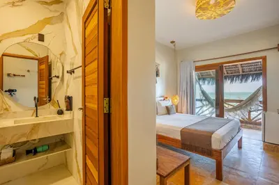 Uma cama ou camas num quarto em Pousada Preamar
