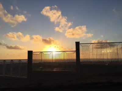 O nascer ou o pôr do sol visto a partir do apartamento