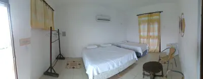 Uma cama ou camas num quarto em Hotel Pousada Summer Way