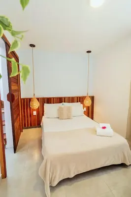 Uma cama ou camas num quarto em Apartamento Manay