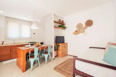 Uma televisão e/ou sistema de entretenimento em Apartamento Manay