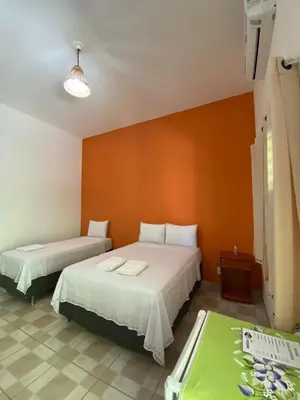 Uma cama ou camas num quarto em Pousada Trilha das Dunas