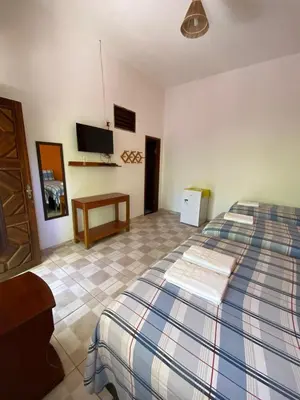 Uma cama ou camas num quarto em Pousada Trilha das Dunas