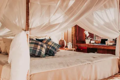 Uma cama ou camas num quarto em Villa Sabiá - Eco Bungalows