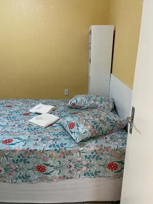 Uma cama ou camas num quarto em Pousada Green Aeroporto Rodoviária