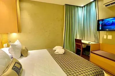 Uma cama ou camas num quarto em Vg Sun Cumbuco by Diego Flats