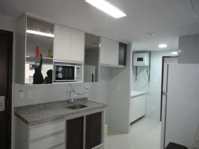 A cozinha ou kitchenette de Apartamento Vista Mar 4 Suítes