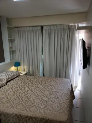 Uma cama ou camas num quarto em Beach Class Fortaleza