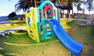 A área de jogos para crianças em ForTemporada - Seu Apto de frente para o mar em Fortaleza