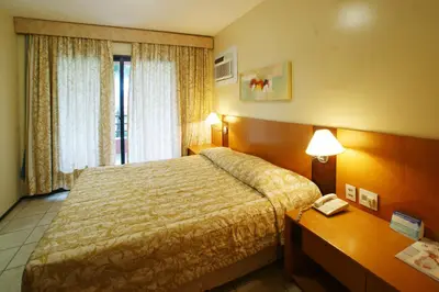 Uma cama ou camas num quarto em Aquaville Aquiraz Hotel