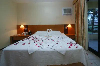 Uma cama ou camas num quarto em Aquaville Aquiraz Hotel