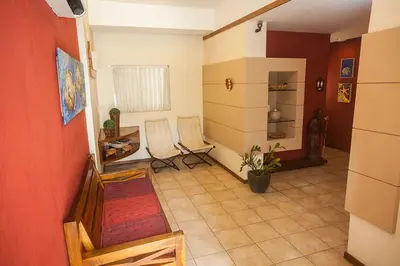 Uma televisão e/ou sistema de entretenimento em Portal Da Praia Hotel
