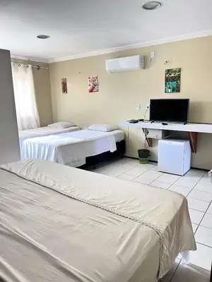 Uma cama ou camas num quarto em Marbello Ariau Hotel