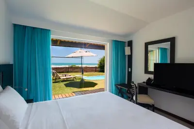 Uma cama ou camas num quarto em Dom Pedro Laguna Beach Resort & Golf by WAM Experience