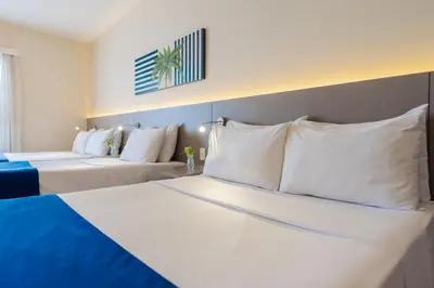 Uma cama ou camas num quarto em Bourbon Hotel Fortaleza