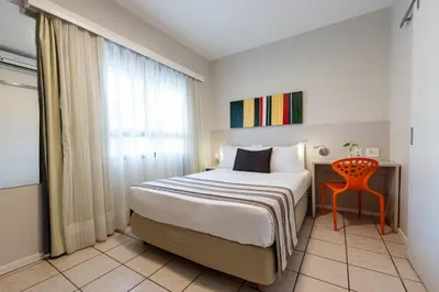 Uma cama ou camas num quarto em Bourbon Hotel Fortaleza