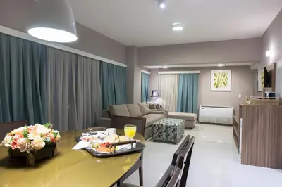 Uma área de estar em Comfort Hotel Fortaleza