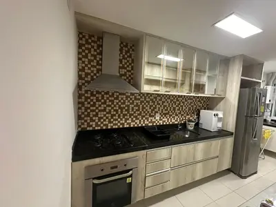 A cozinha ou kitchenette de Apartamento - Resort Golf Ville