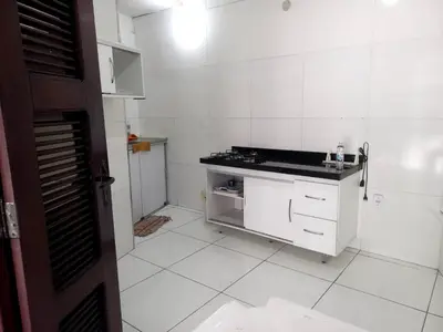 A cozinha ou kitchenette de Suítes Centro Praia
