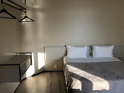 Uma cama ou camas num quarto em Particular Golden Beira Mar