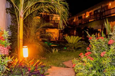 Um jardim no exterior de Residence Bons Ventos Jeri