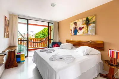 Uma cama ou camas num quarto em Xainã Pousada de Charme