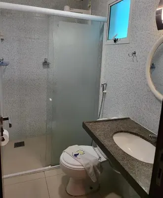 Uma casa de banho em Hotel Encontro do Sol