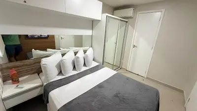 Uma cama ou camas num quarto em Apartments Vg Fun Praia do Futuro