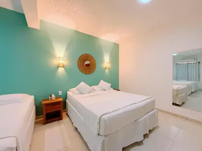 Uma cama ou camas num quarto em Pousada Jeri Dunas