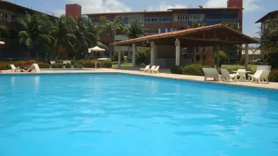 A piscina em ou perto de APARTAMENTOS NO CARTIER PRAIA DO FUTURO FORTALEZA CONFORTAVEL COM 2 QRTOS 1 suite